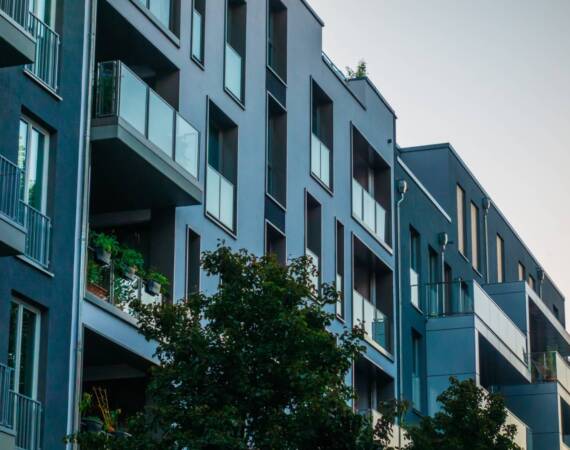 darken-colored-apartment-houses-in-a-row-2026-03-25-22-58-13-utc