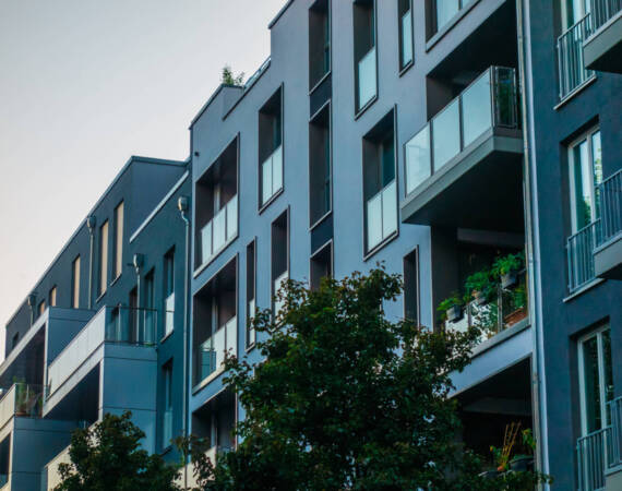 darken-colored-apartment-houses-in-a-row-2026-03-25-22-58-13-utc