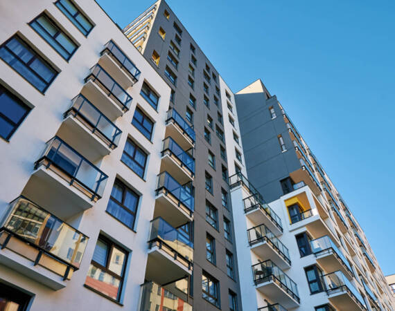 Modern city architecture, Residential house building facade with balconies in Warsaw.